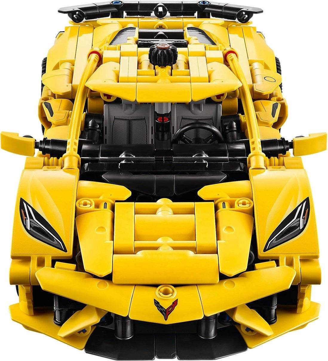 Yellow toy car with black accents on a white background
