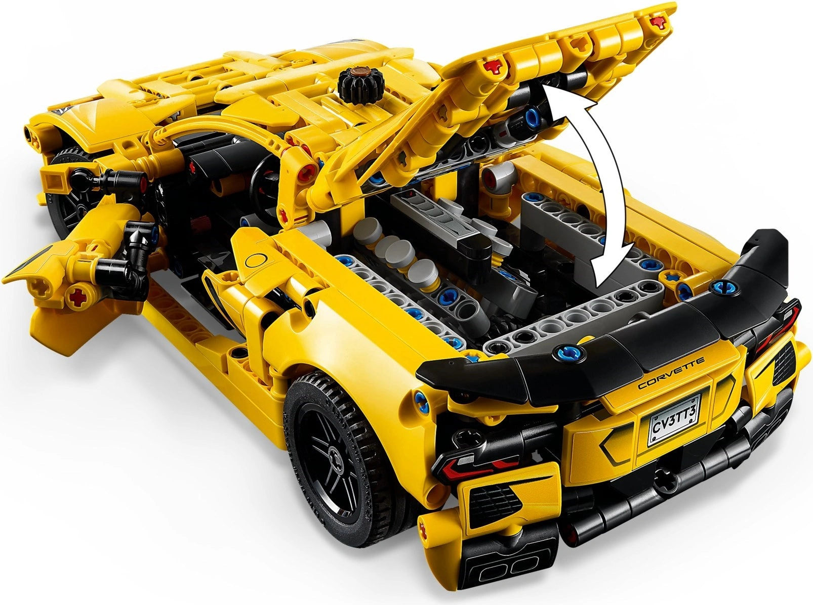 Yellow toy car model with open hood on a white background