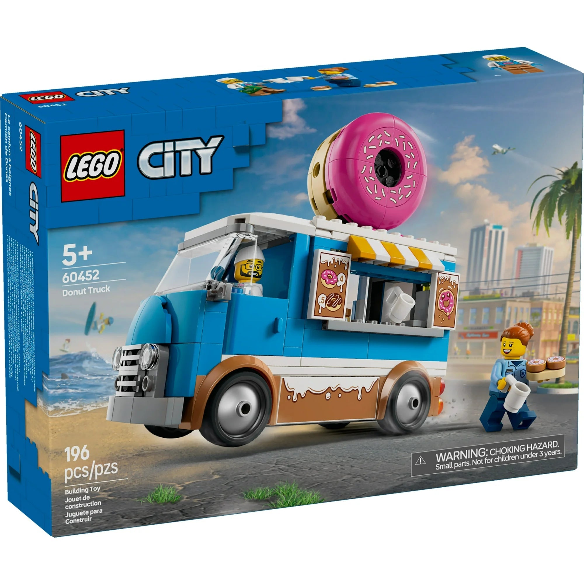 LEGO City Donut Truck set packaging with toy truck and characters on a city street background.