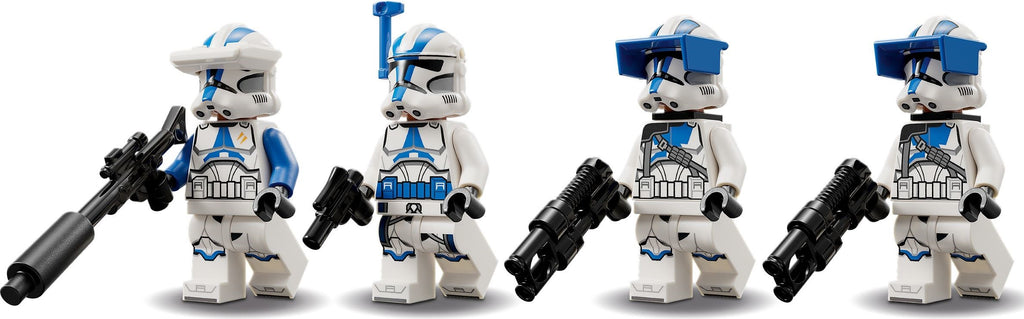 Four stormtrooper figures from a popular franchise, each with a unique pose and weapon.