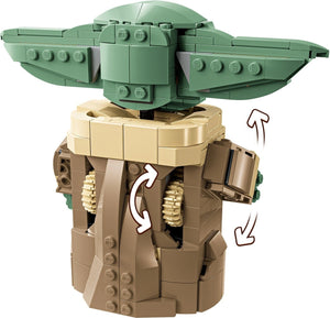 Toy figure of a character with green head and tan body on a white background