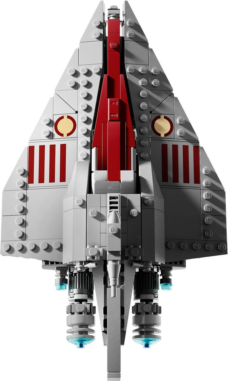 Toy spaceship model made of interlocking bricks on a white background
