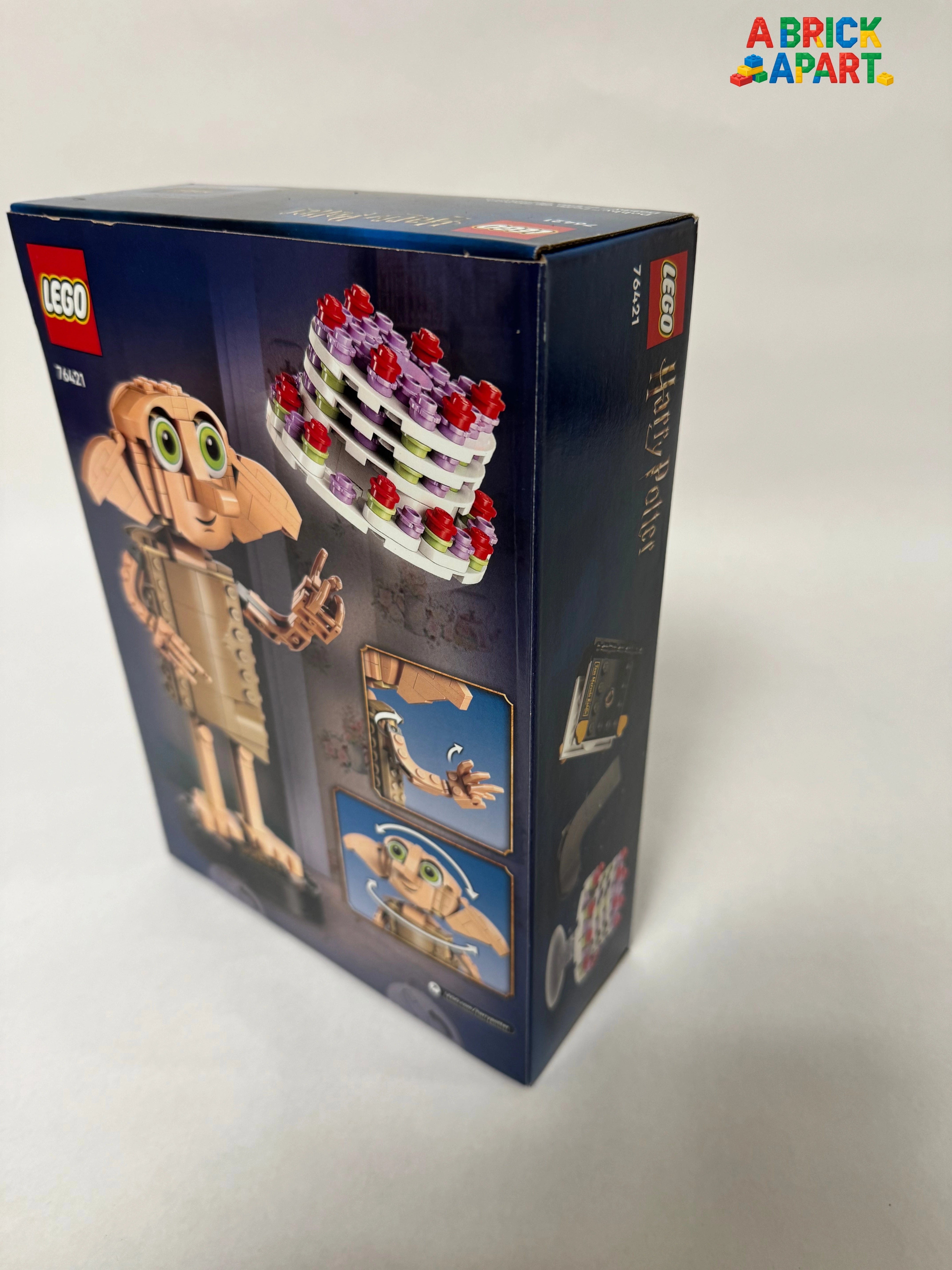 LEGO box featuring a character with a cake on a white background