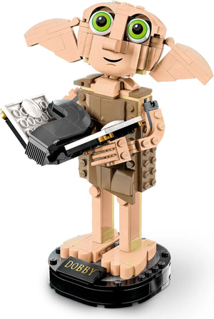 Toy figure of Dobby the house elf made from interlocking bricks on a white background
