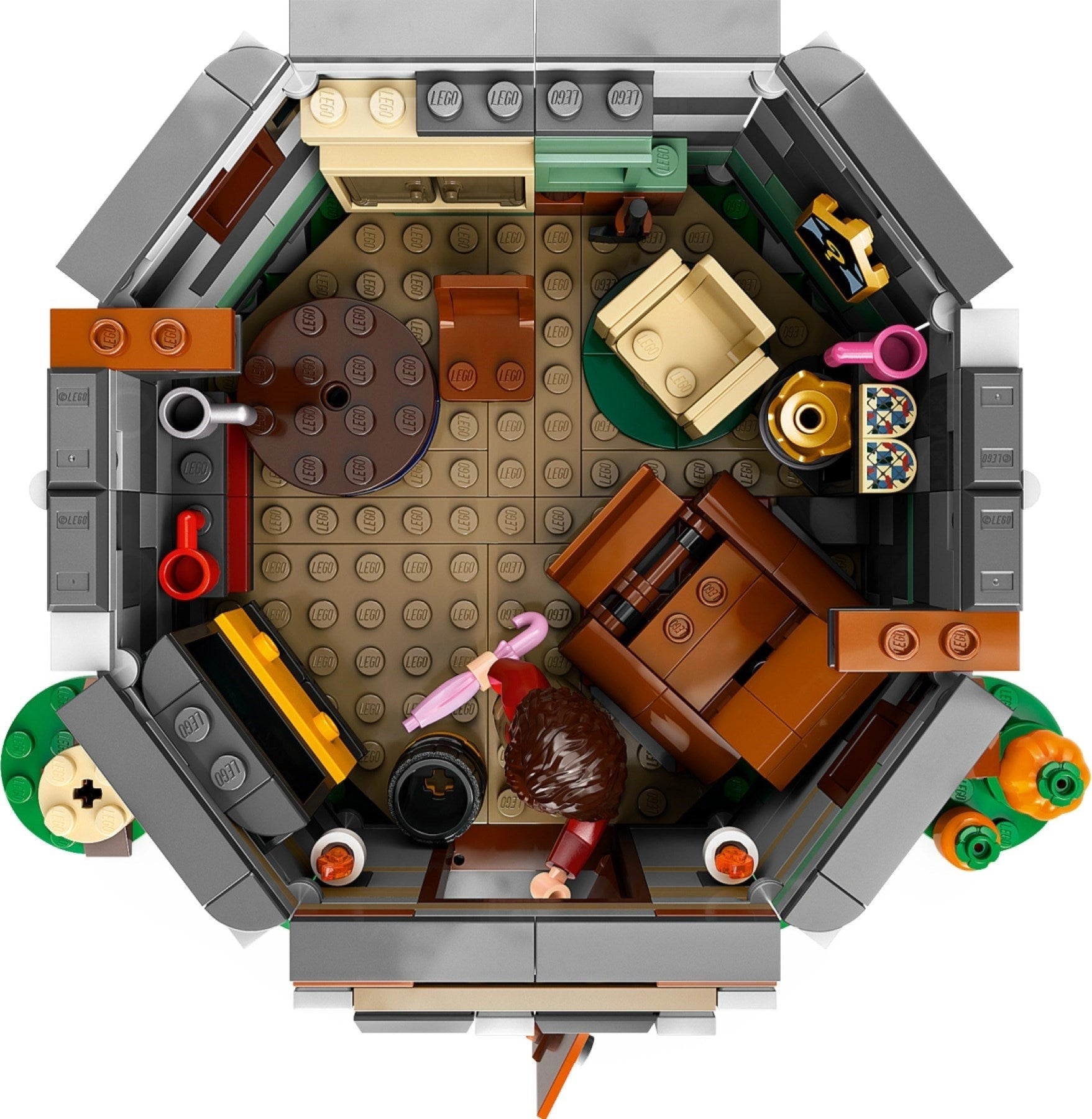 Top-down view of a detailed LEGO model with various elements on a white background