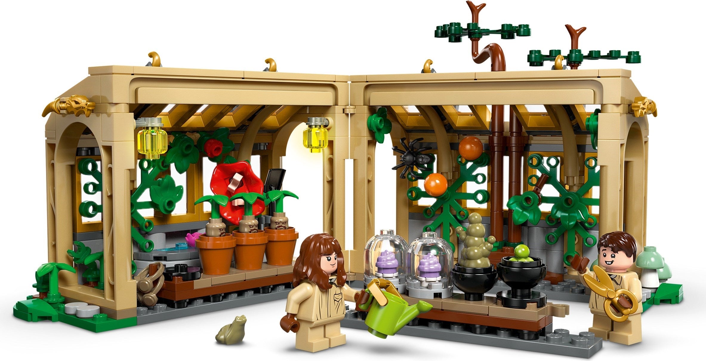 LEGO model of a greenhouse with plants and characters on a white background