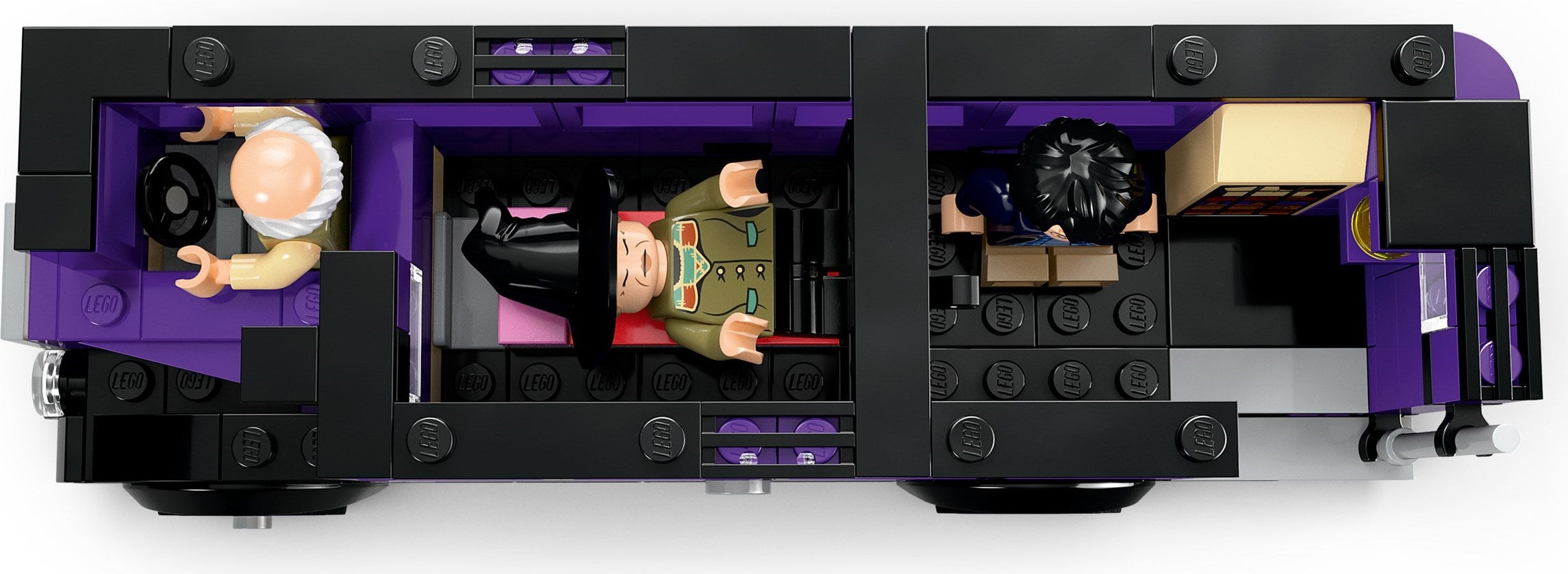 Close-up of a LEGO vehicle with detailed interior and characters on a white background