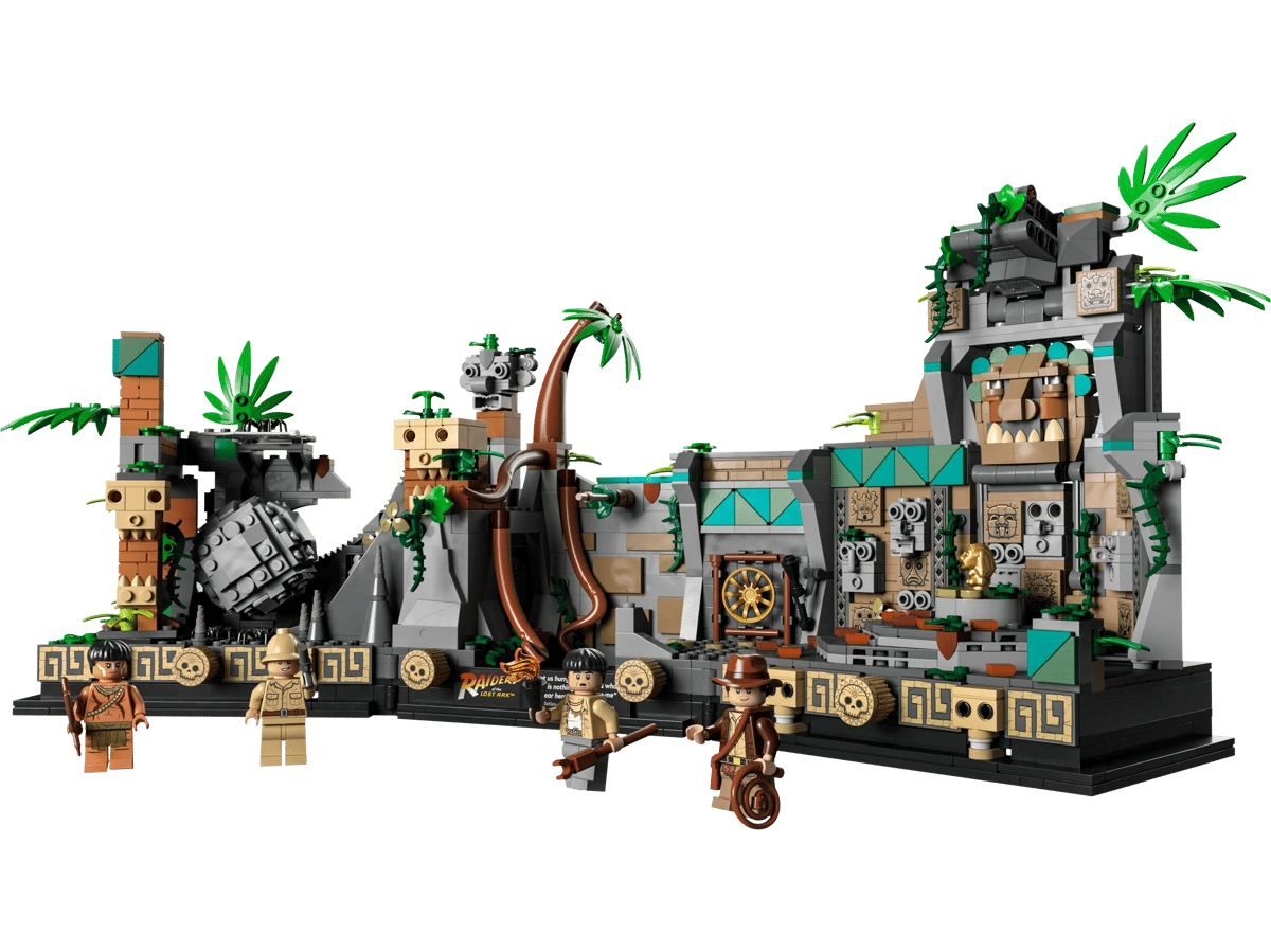 Toy set with a jungle theme featuring buildings, characters, and a dragon-like creature on a white background.