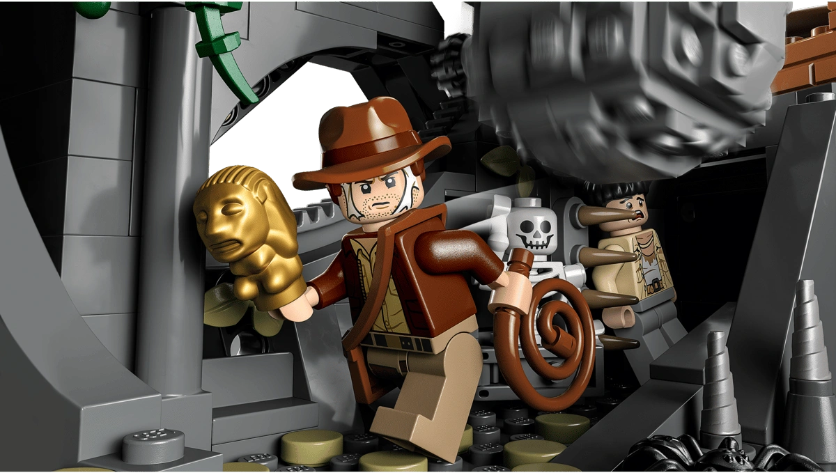 LEGO figure of a explorer with a golden lion head in an adventurous setting