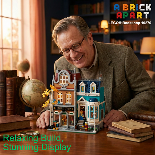 Man with glasses smiling at a LEGO Bookshop set on a table with books and a globe.