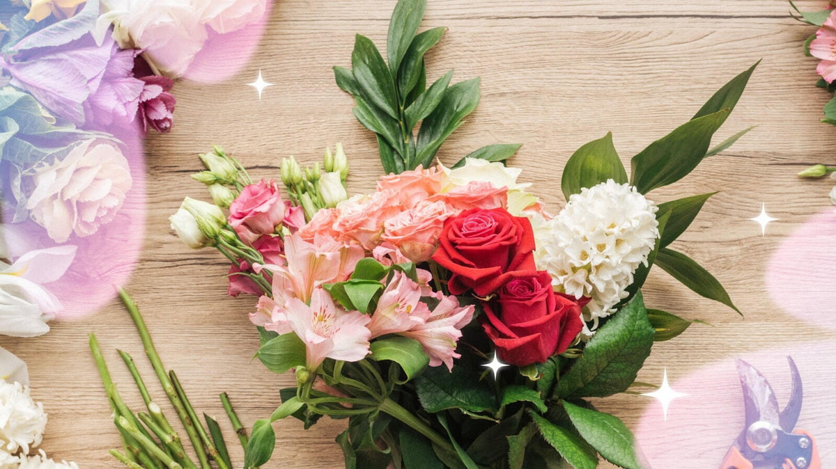 Bouquet of flowers on a wooden surface with decorative elements
