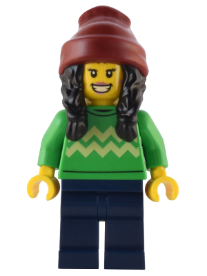 LEGO minifigure wearing a green sweater with yellow zigzag pattern, navy pants, and a red beanie on a white background.